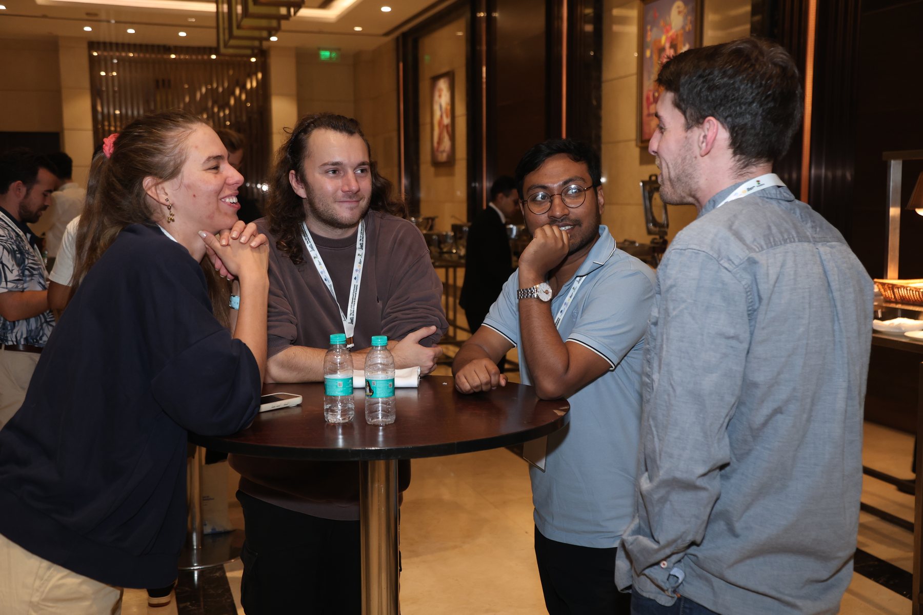 Conference participants talking together at DSAA 2026